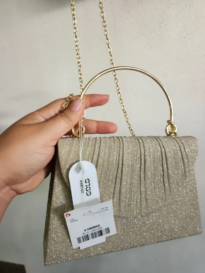 Bolso de mano clutch dorado brillante✨